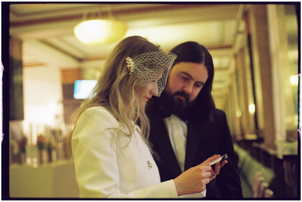 Film wedding photographer captures cinematic New York elopement at City Clerk’s Office, minimal and romantic ceremony.