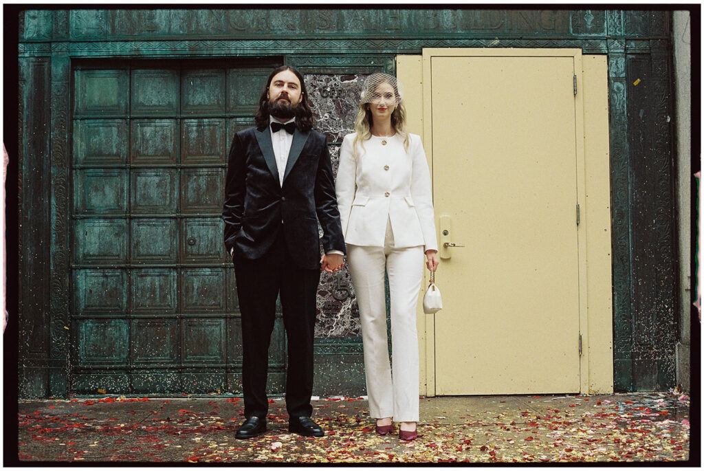Film wedding photographer captures cinematic New York elopement at City Clerk’s Office, minimal and romantic ceremony.