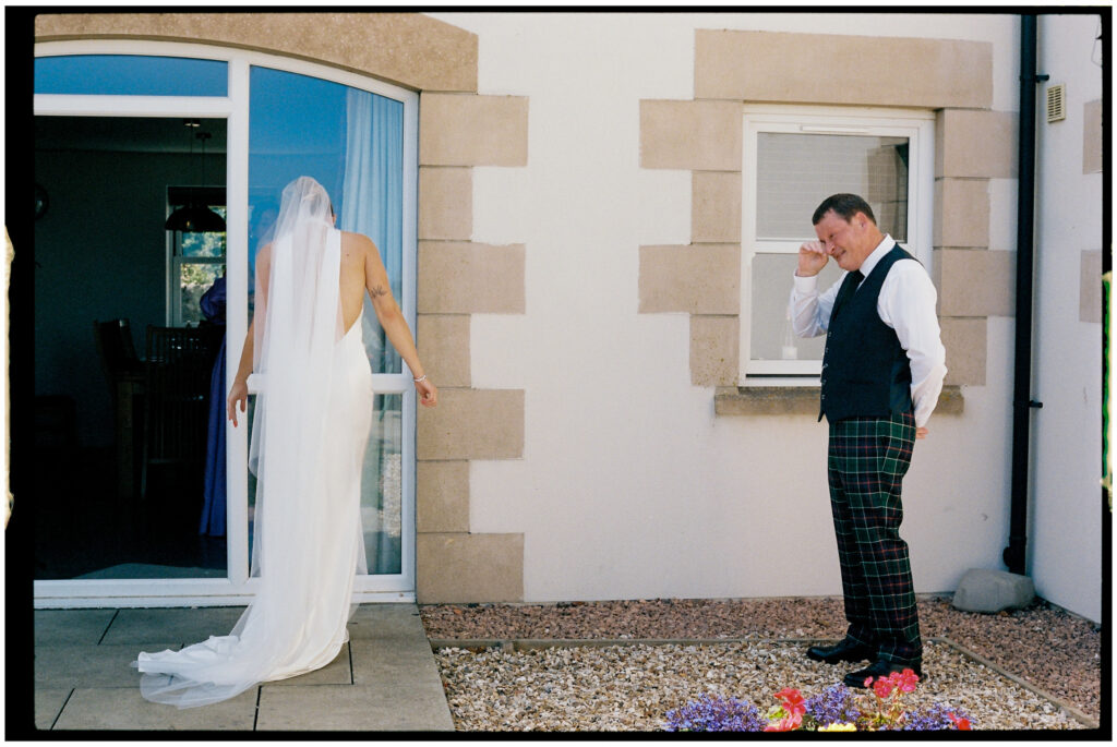Bride and groom captured on film during their Kinkell Byre wedding in St Andrews, Scotland