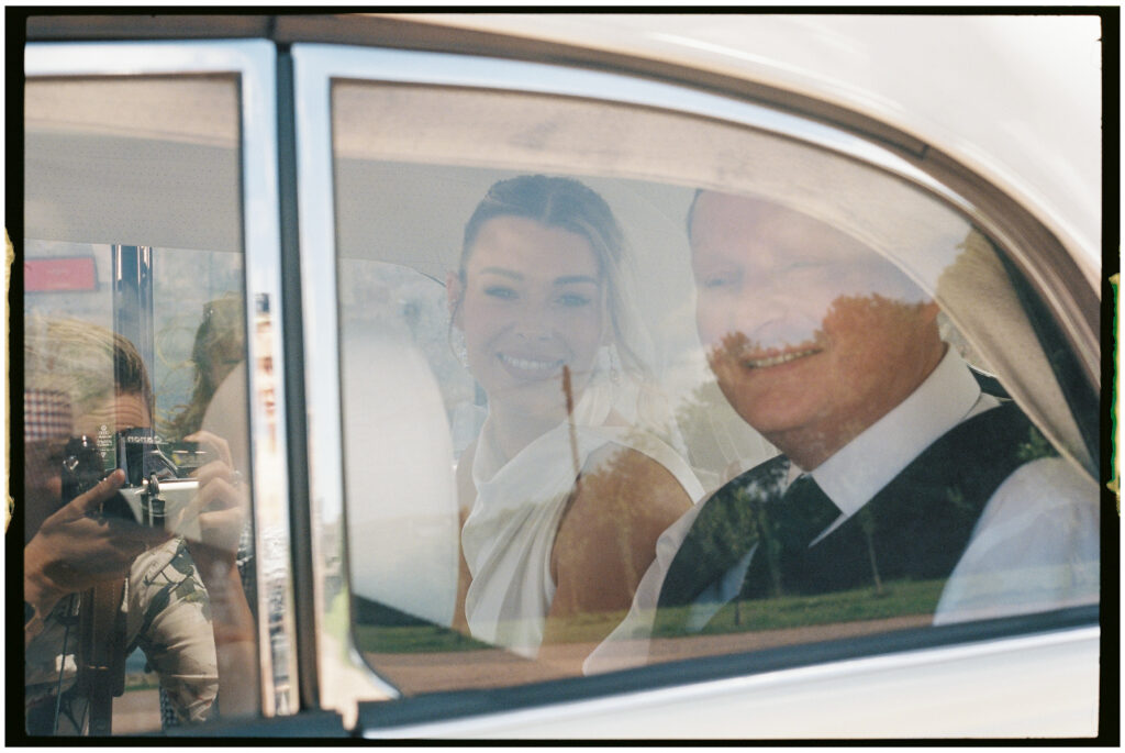 Bride and groom captured on film during their Kinkell Byre wedding in St Andrews, Scotland