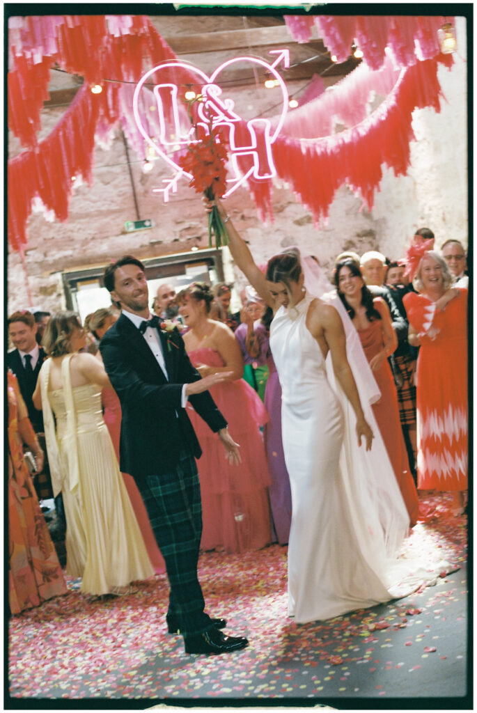Bride and groom captured on film during their Kinkell Byre wedding in St Andrews, Scotland