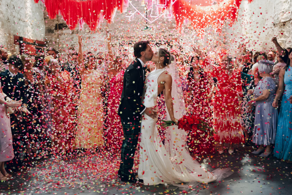Bride and groom captured on film during their Kinkell Byre wedding in St Andrews, Scotland