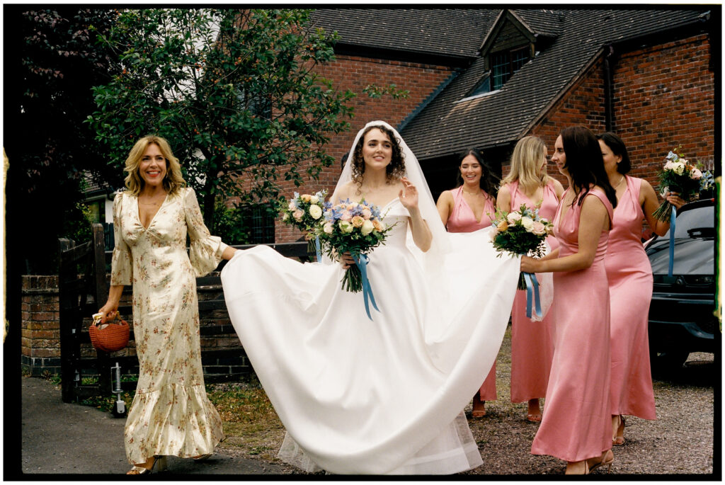 Bride and Bridesmaids walking to church