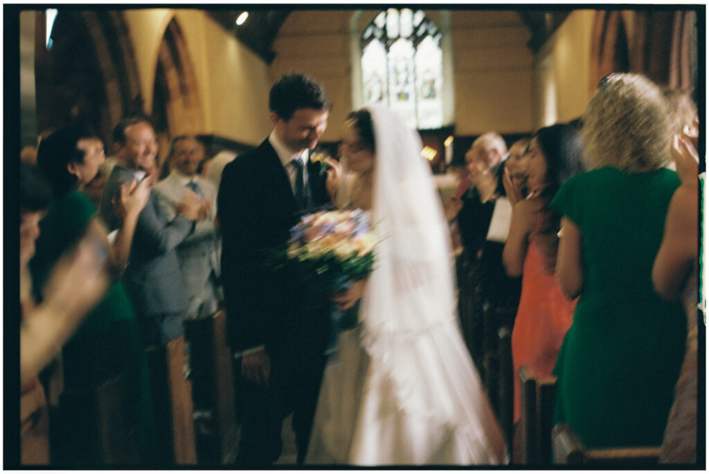 Couple getting married in a Church in Shropshire shot on 35mm film photography